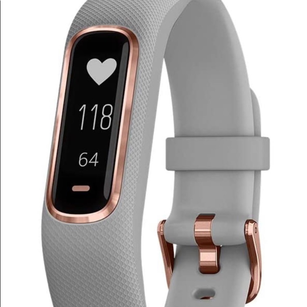 Grey and Rose Gold Garmin Vivosmart 4 in great condition.